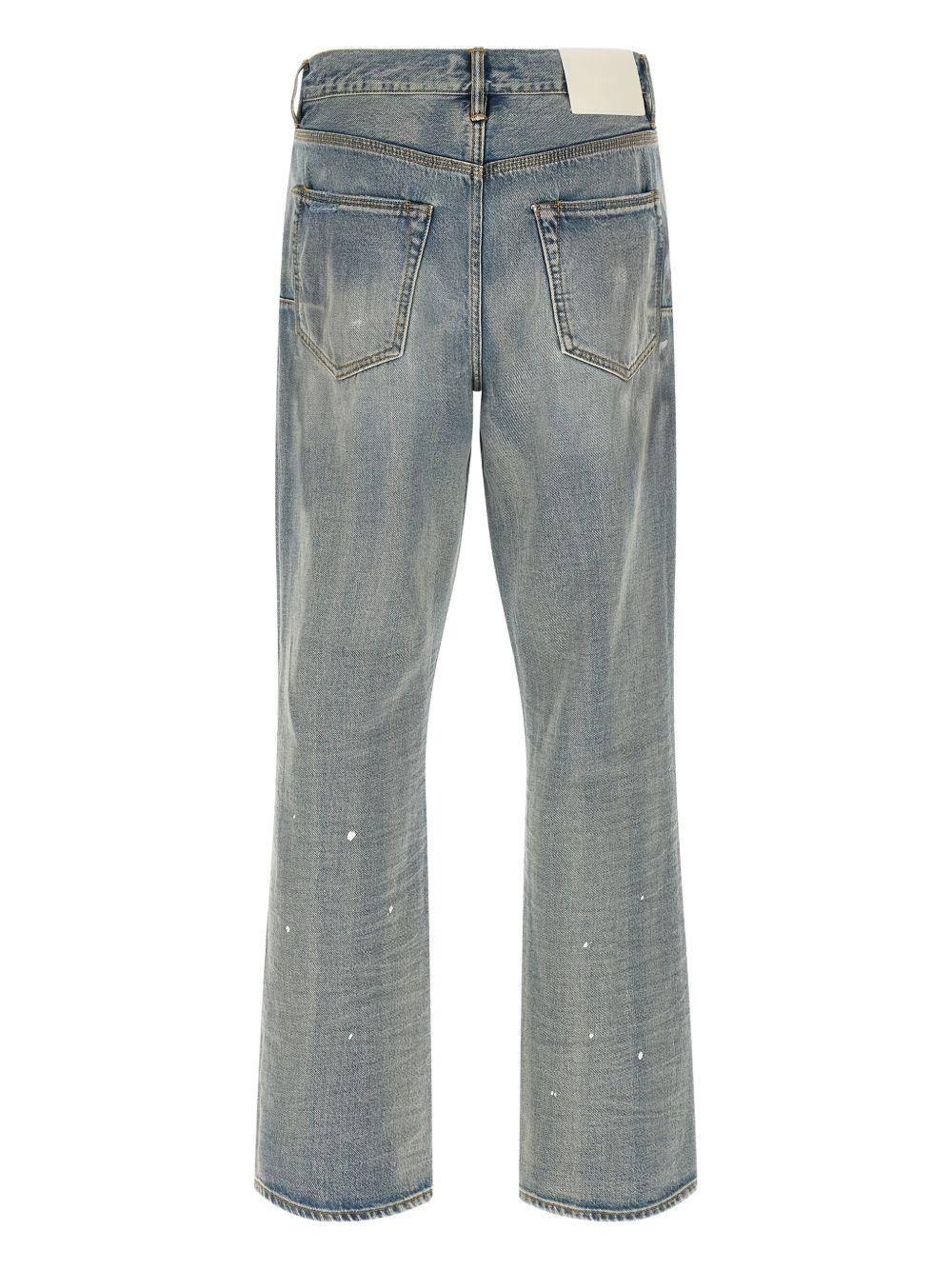 Jeans indigo con effetto vissuto 