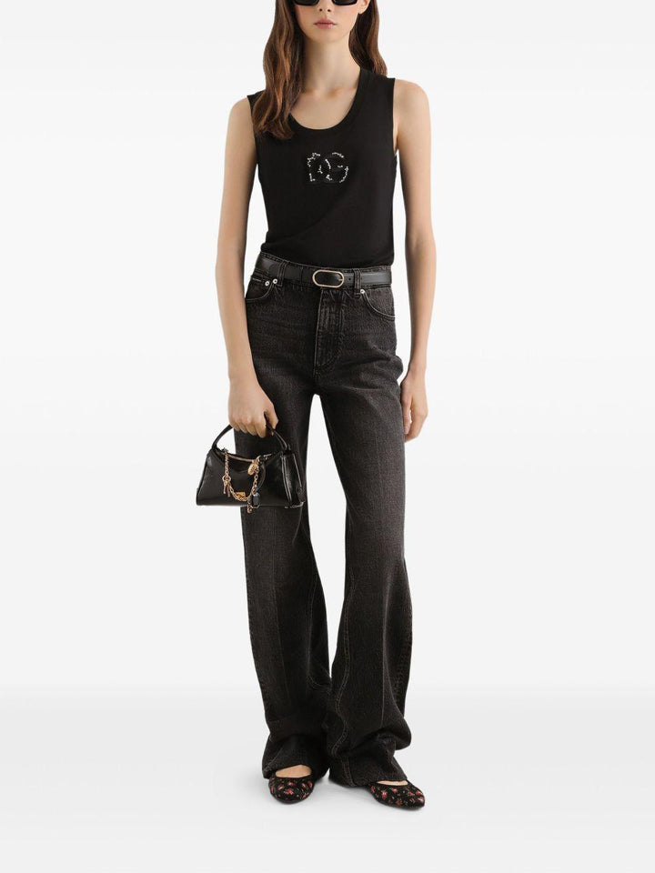 Jeans con placca logo 