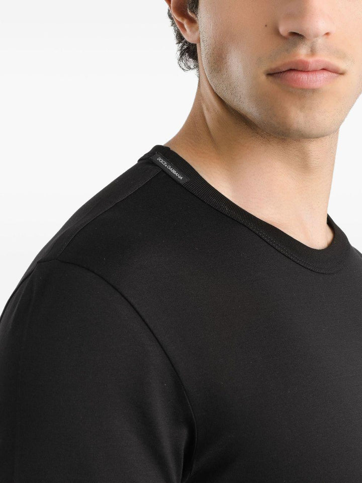 T-shirt nera in cotone con logo ricamato 