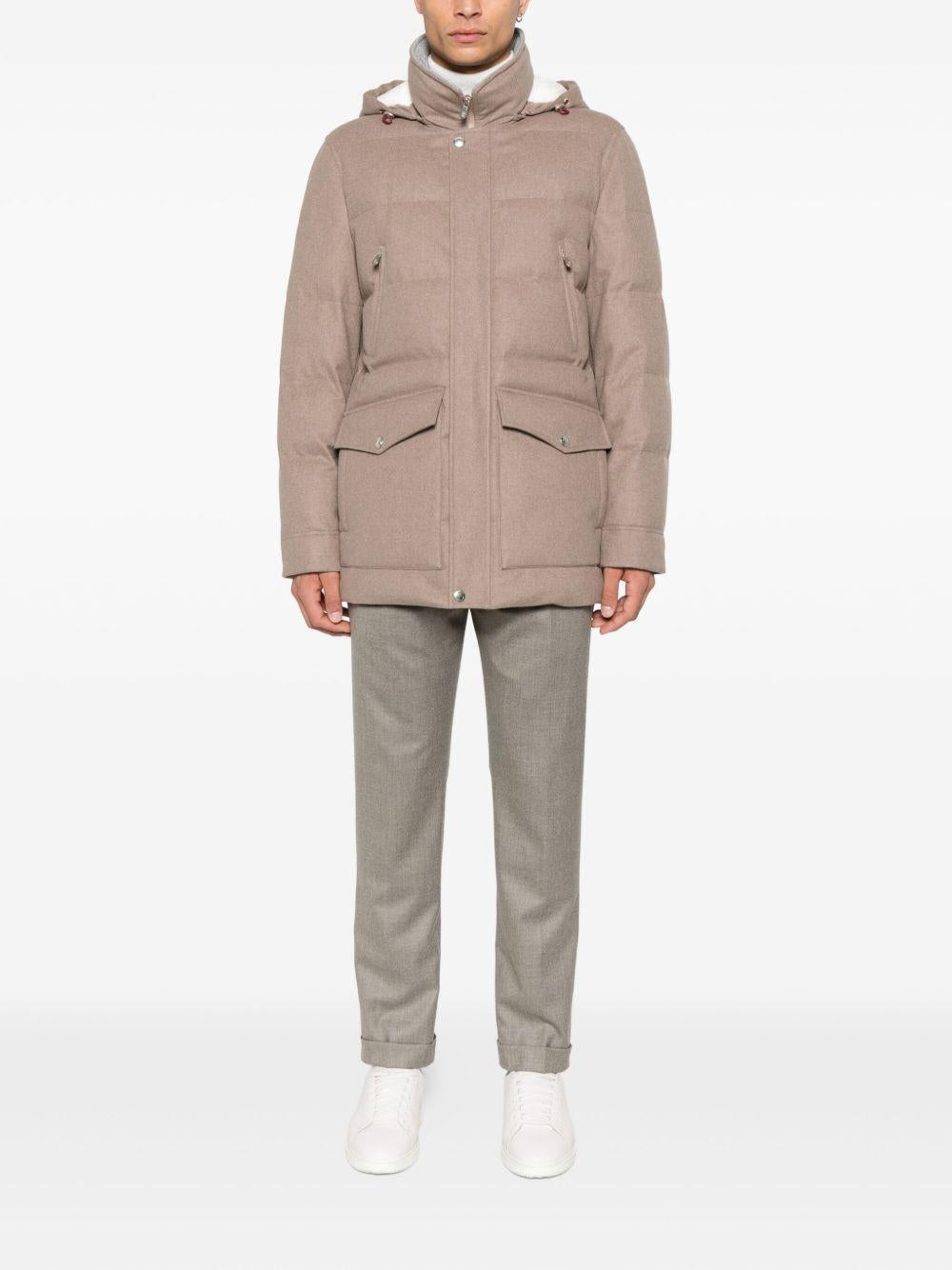 Giacca trapuntata beige con cappuccio 
