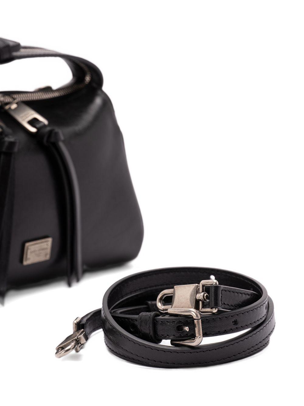 Clutch in pelle con zip 
