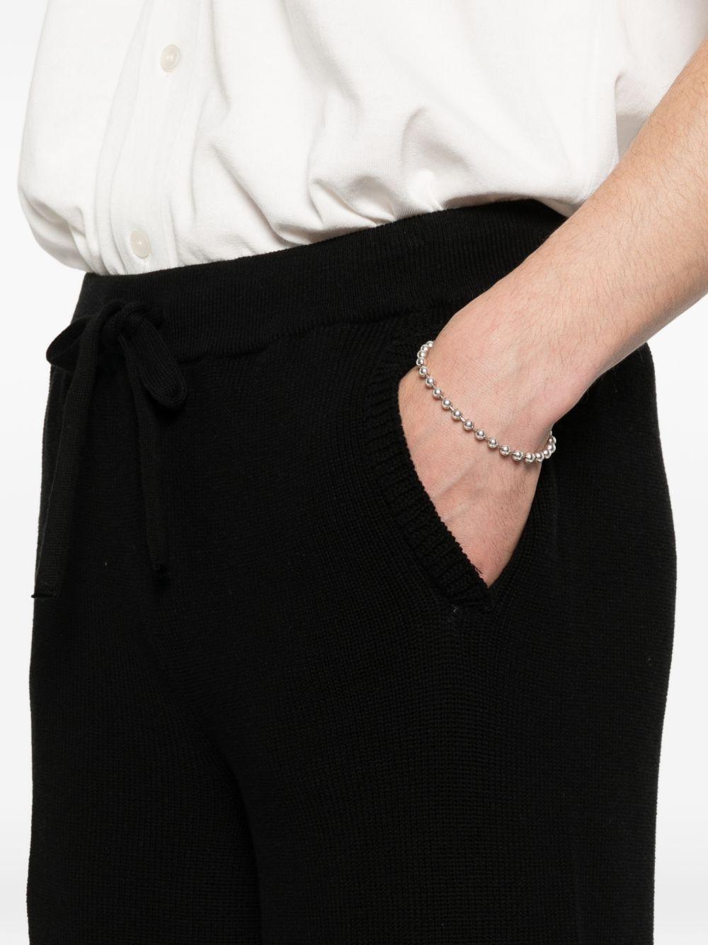 Shorts neroi in maglia con coulisse 