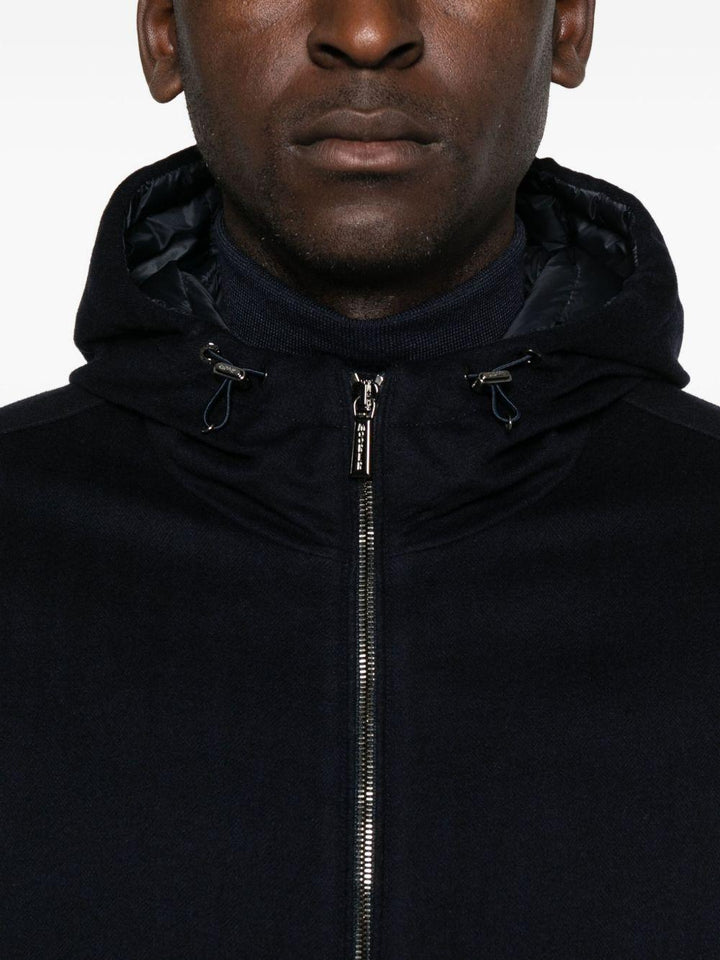 Giubbino  blu con zip e cappuccio 