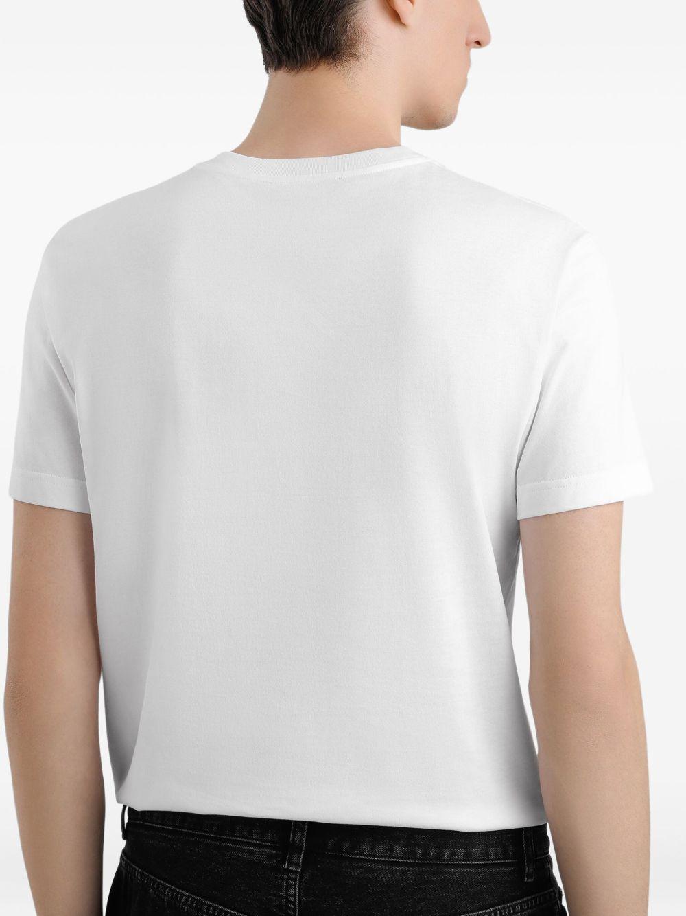 T-shirt bianca con logo e scritte frontali 
