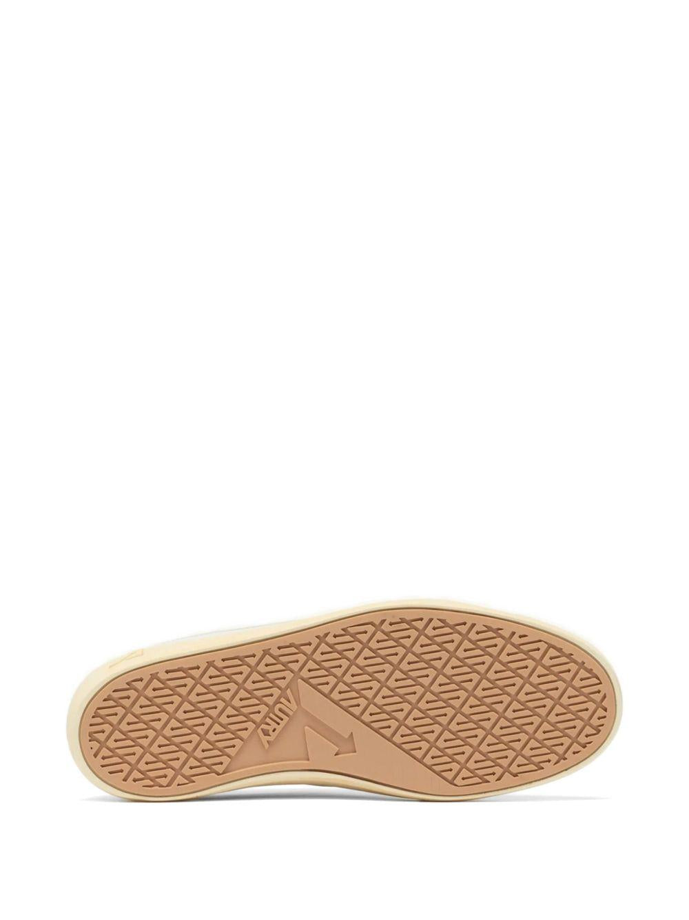 Sneakers bianche in pelle 