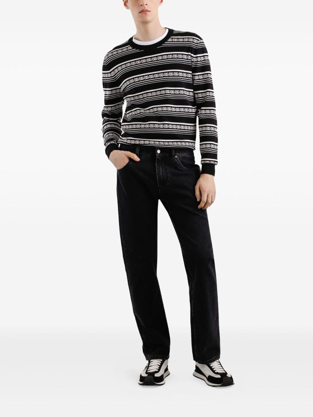 Jeans neri in cotone con applicazione logo