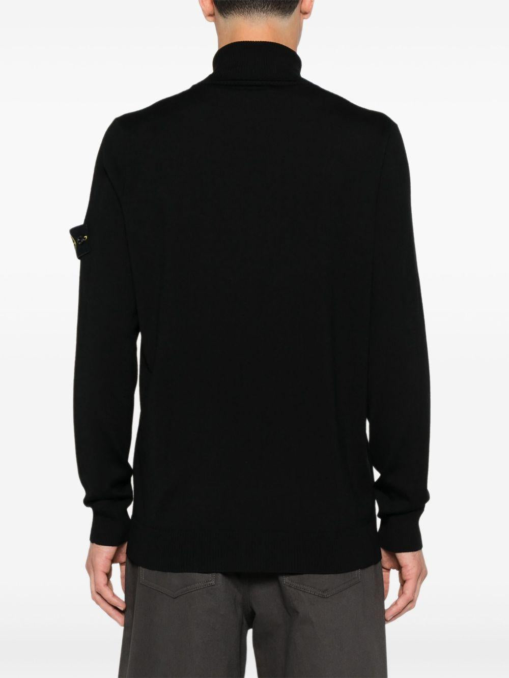 Maglione nero con applicazione Compass 