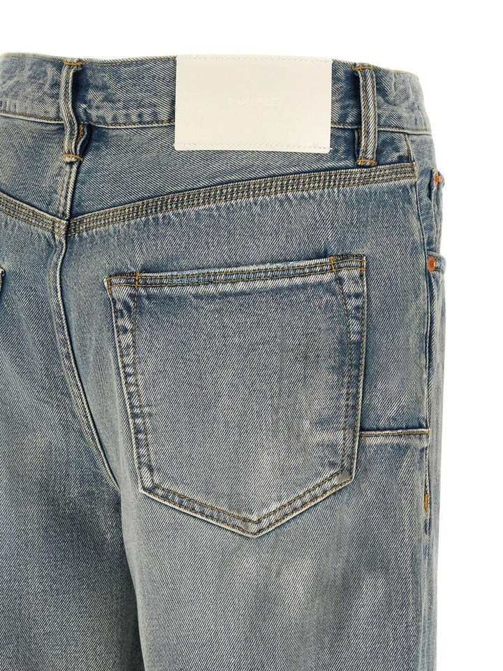 Jeans indigo con effetto vissuto 