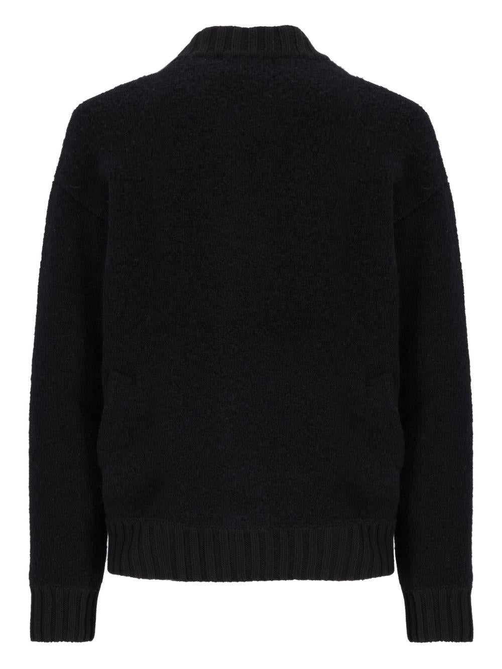 Bomber nero con bottoni 