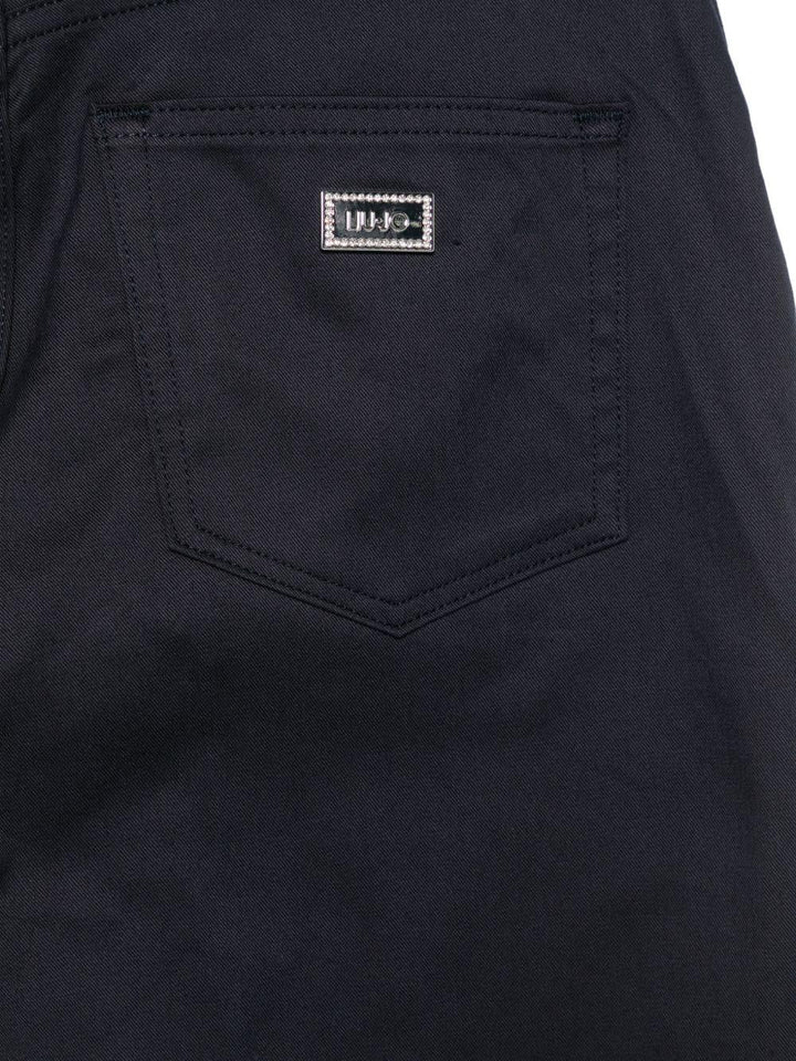 Pantaloni con patch logo 