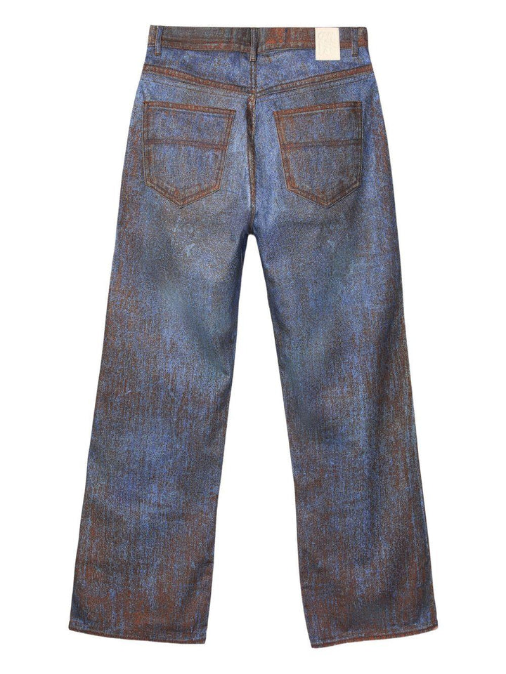 Jeans blu e marroni effetto vernice 