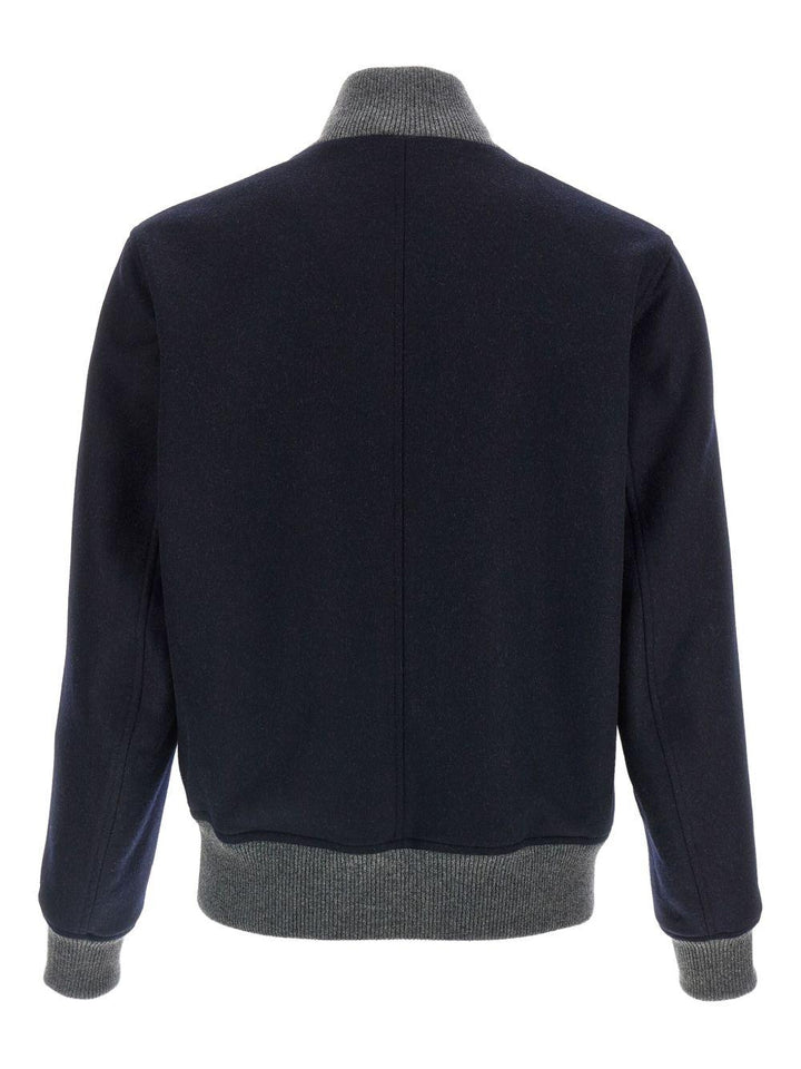 Bomber navy con bottoni e tasche con patta 