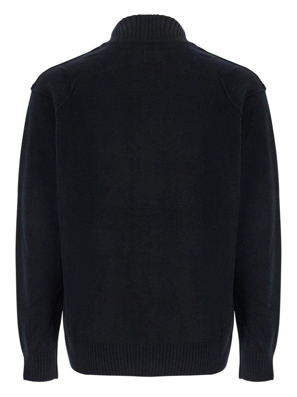 Cardigan nero in lana di agnello con zip 