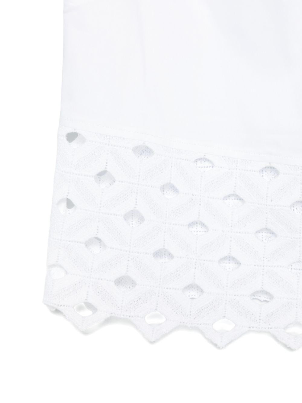 Top crop smanicato Maggio 