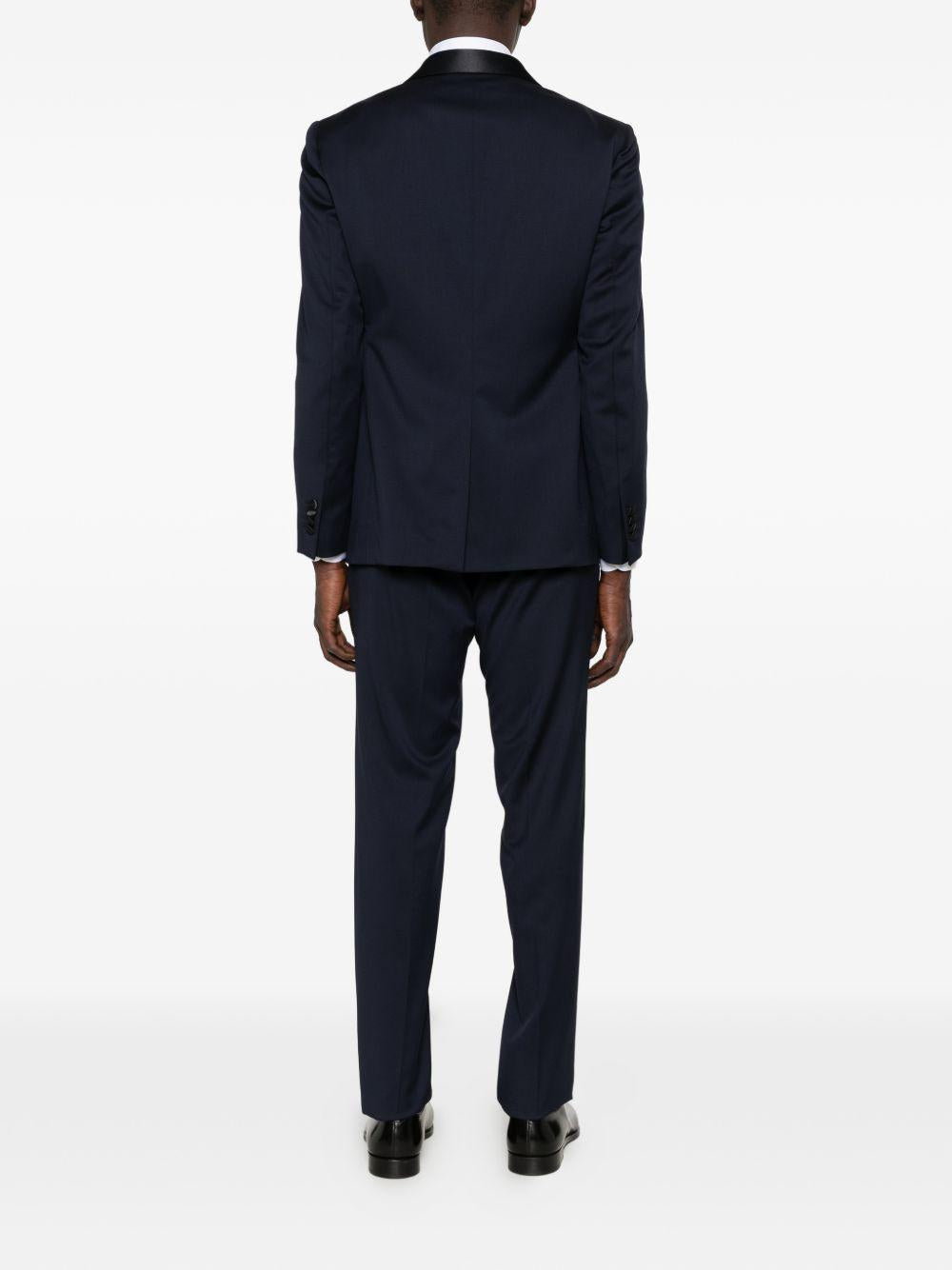 Smoking doppiopetto con profili in satin blu navy 