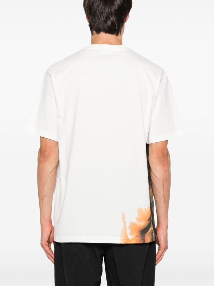 T-shirt bianca con stampa astratta 
