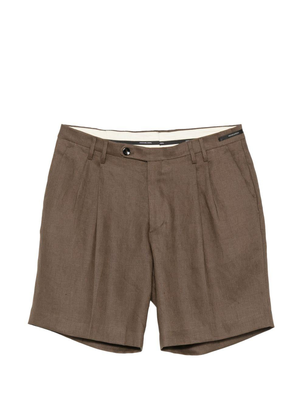 Shorts marroni con pieghe 