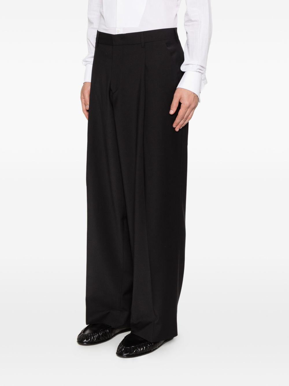 Pantaloni ampi con pinces neri 