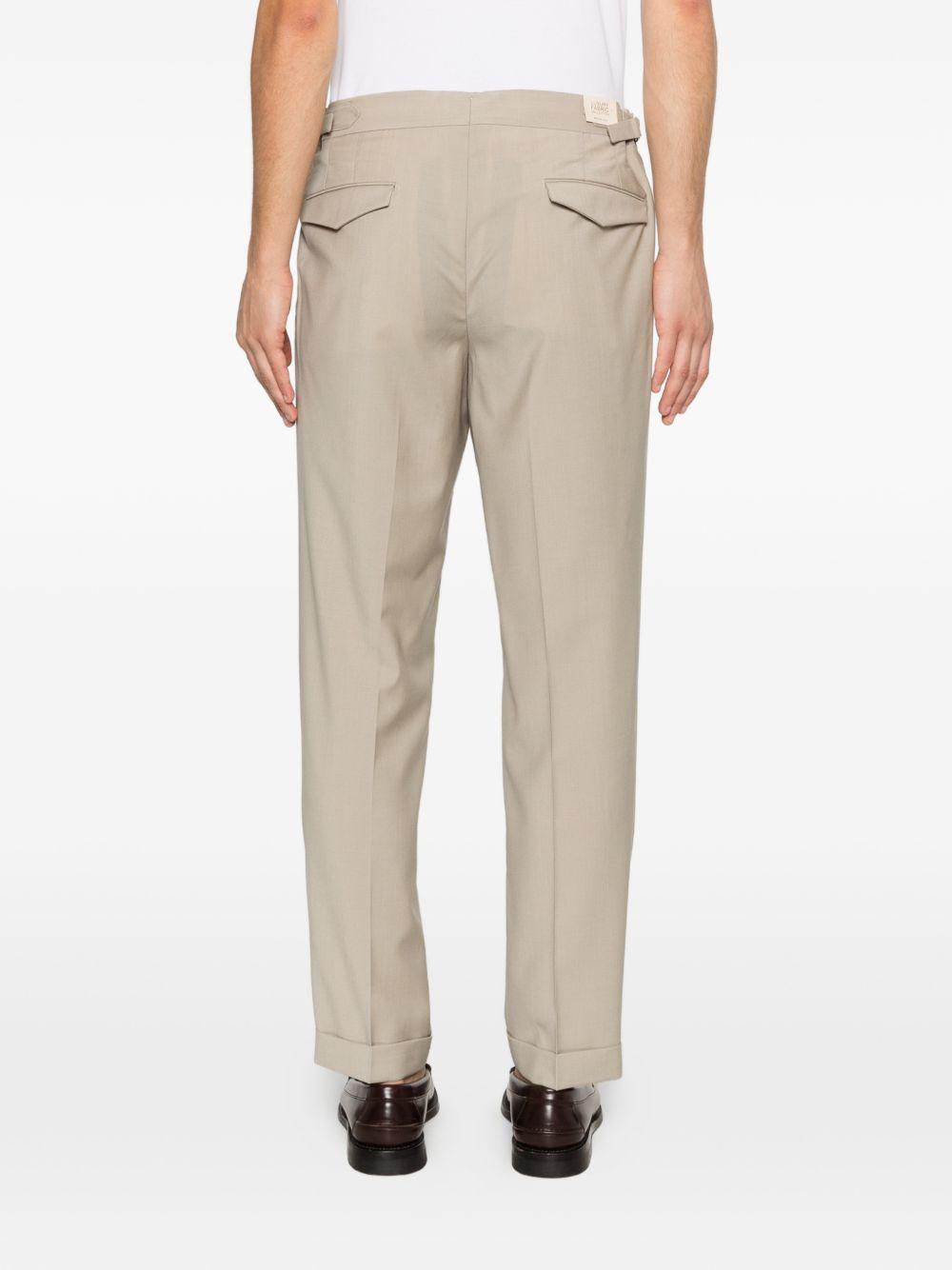 Pantaloni sartoriali kaki con pieghe 