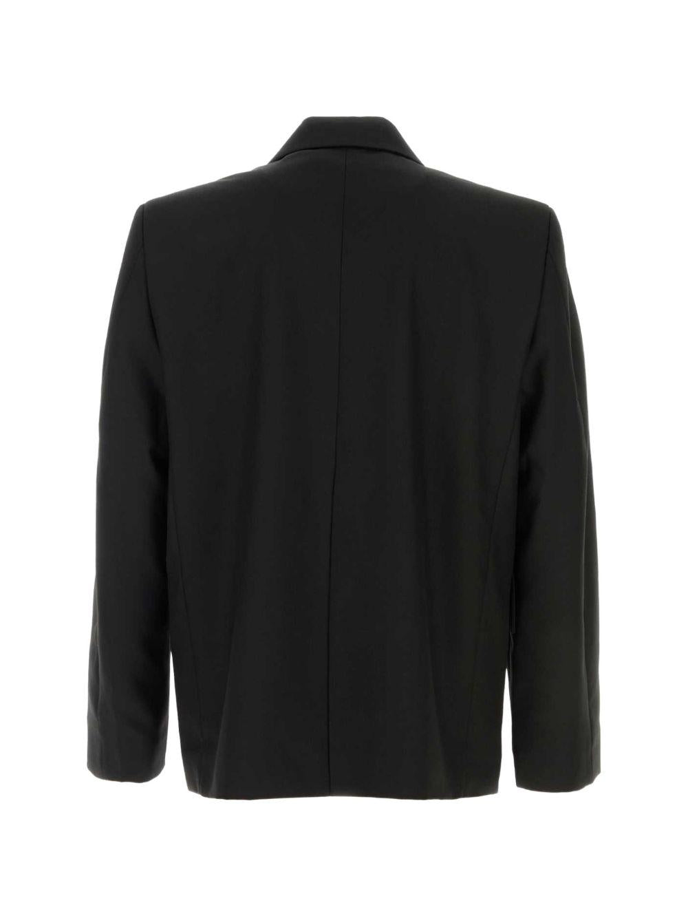 Blazer nero con revers classici e tasche con patta 