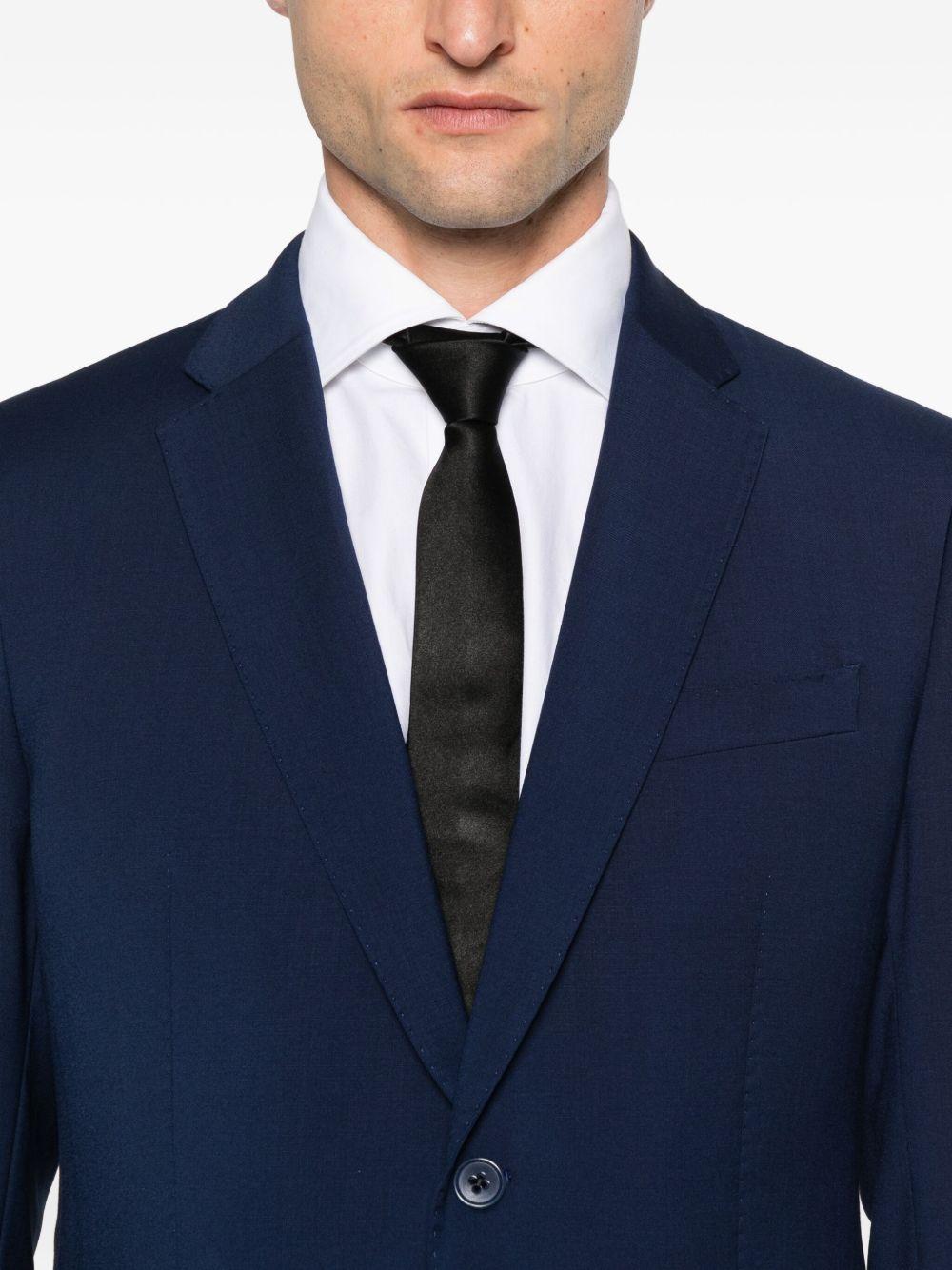 Completo monopetto in lana vergine blu 