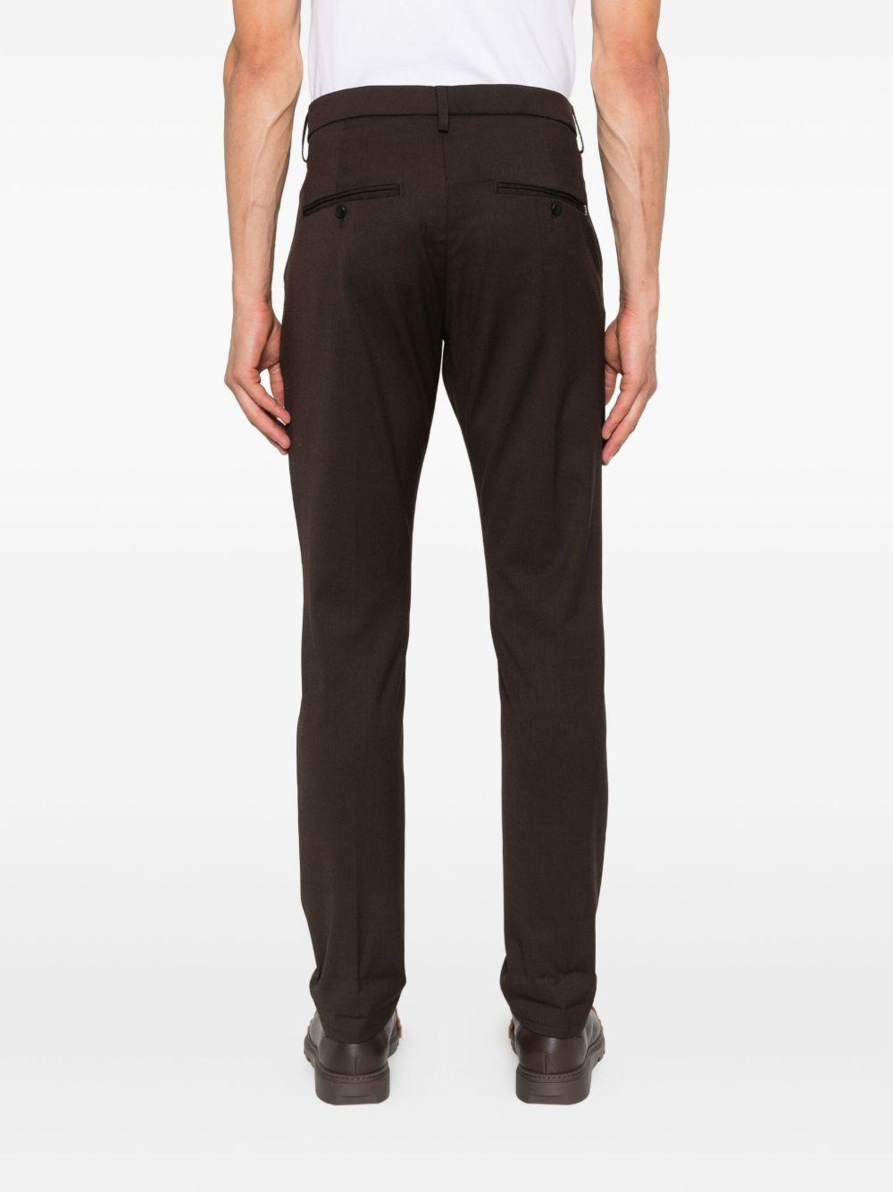Pantaloni marroni Gaubert in lana con risvolti 