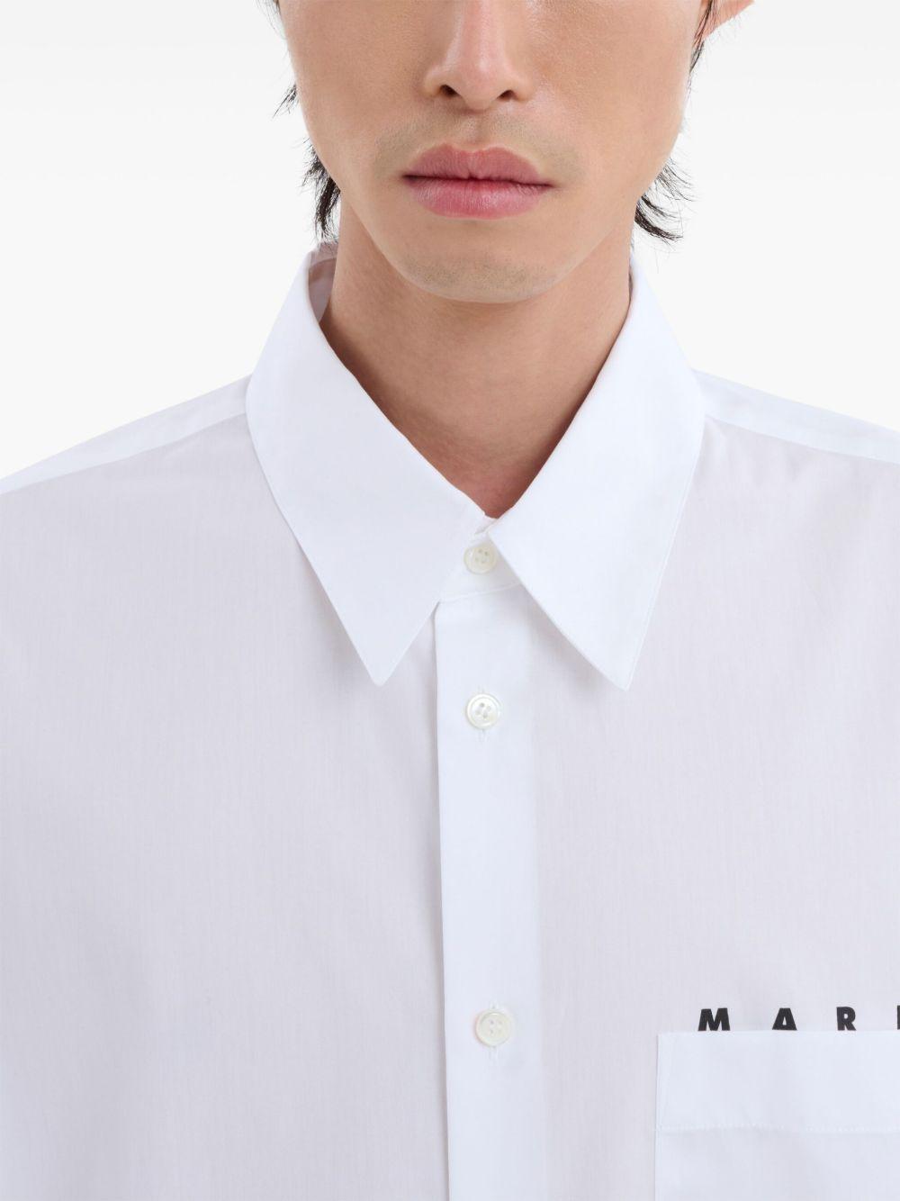 Camicia bianca con logo 
