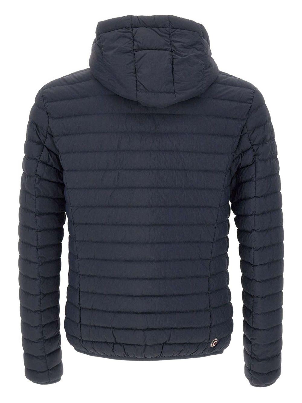 Piumino trapuntato blu con cappuccio 