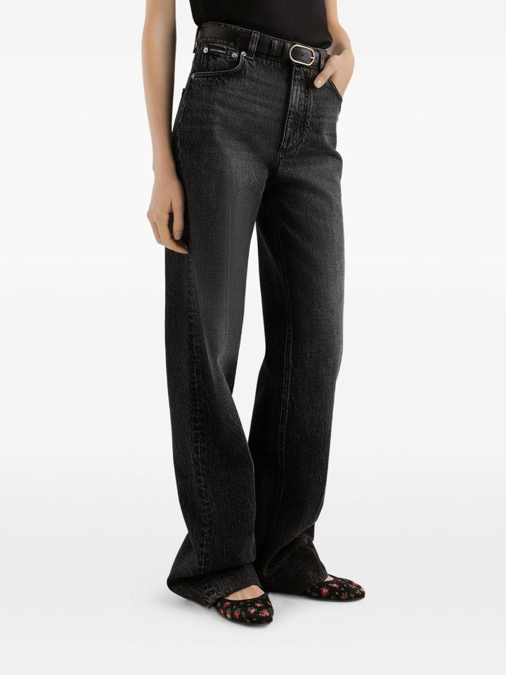 Jeans con placca logo 