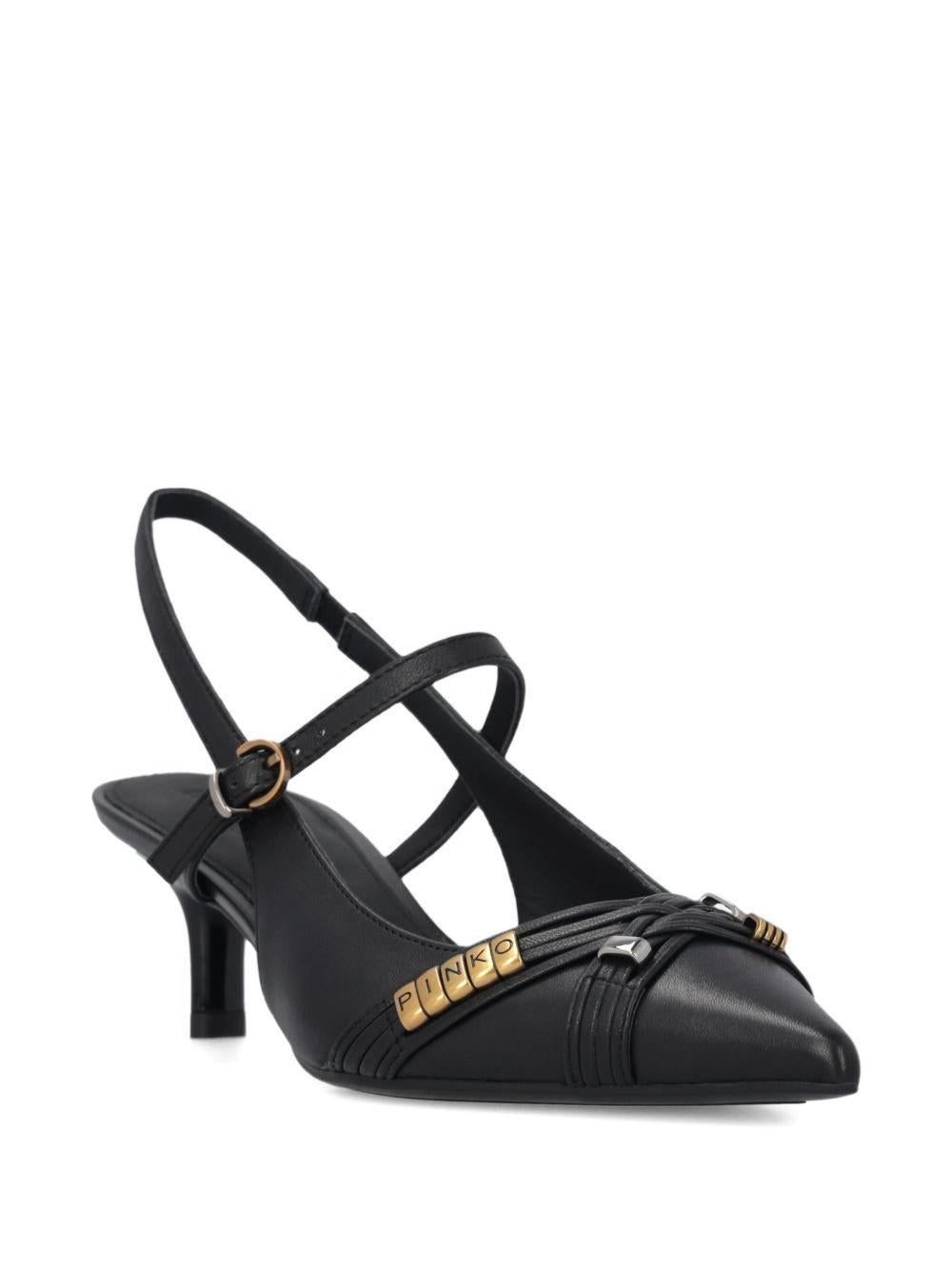 Pumps con cinturino posteriore 