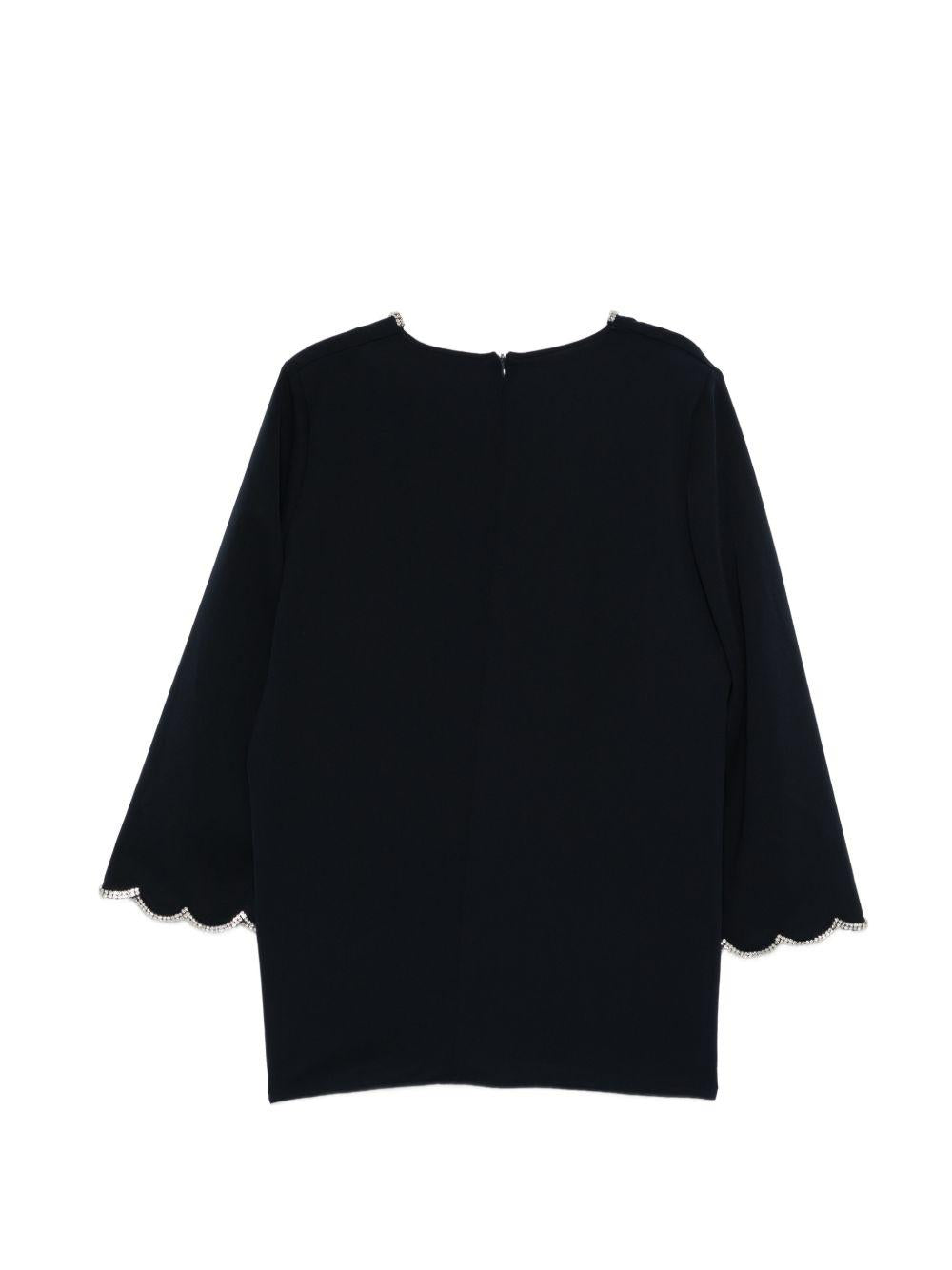 Blusa Mrecrisma con bordo a smerlo 