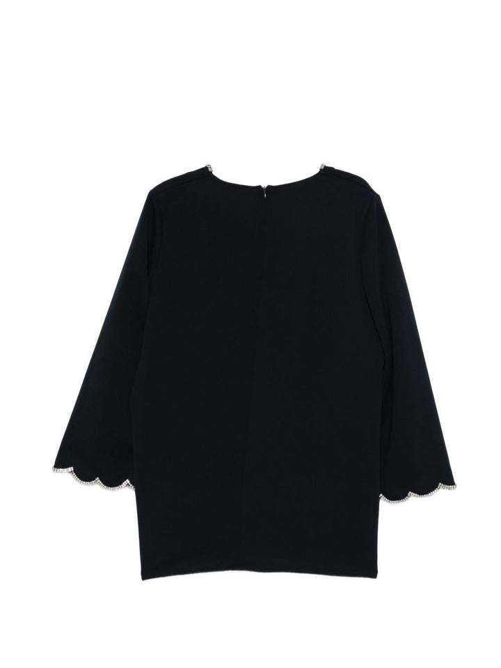 Blusa Mrecrisma con bordo a smerlo 