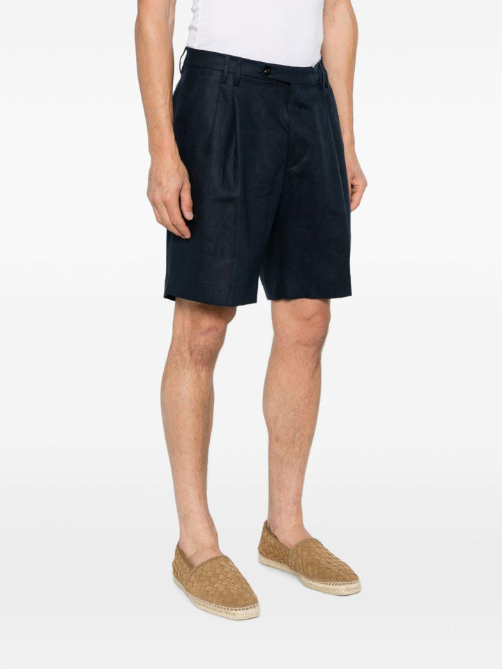Shorts navy con pieghe 