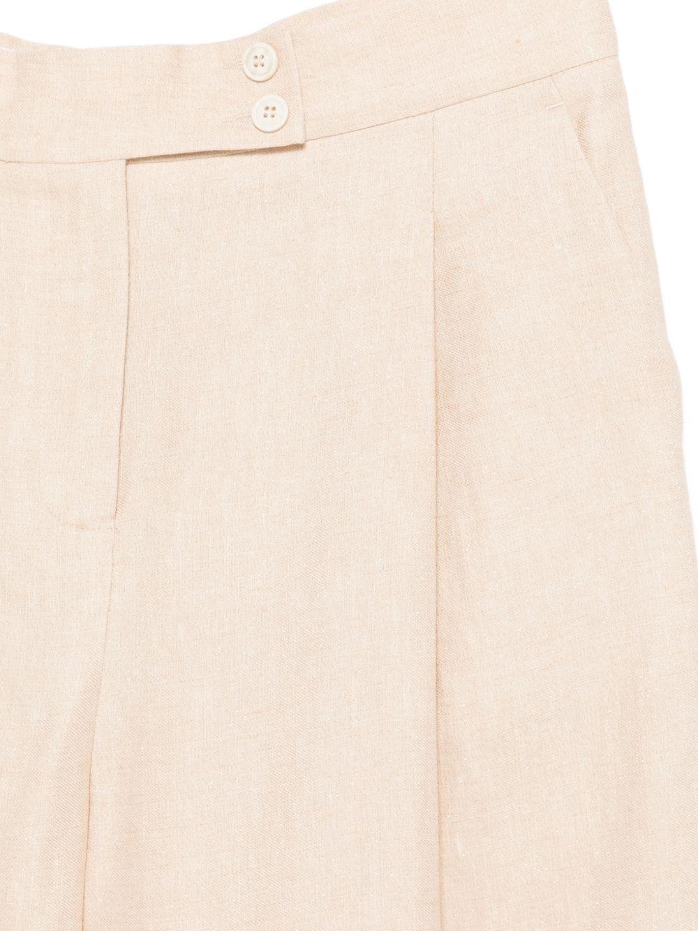 Pantaloni con bottoni 