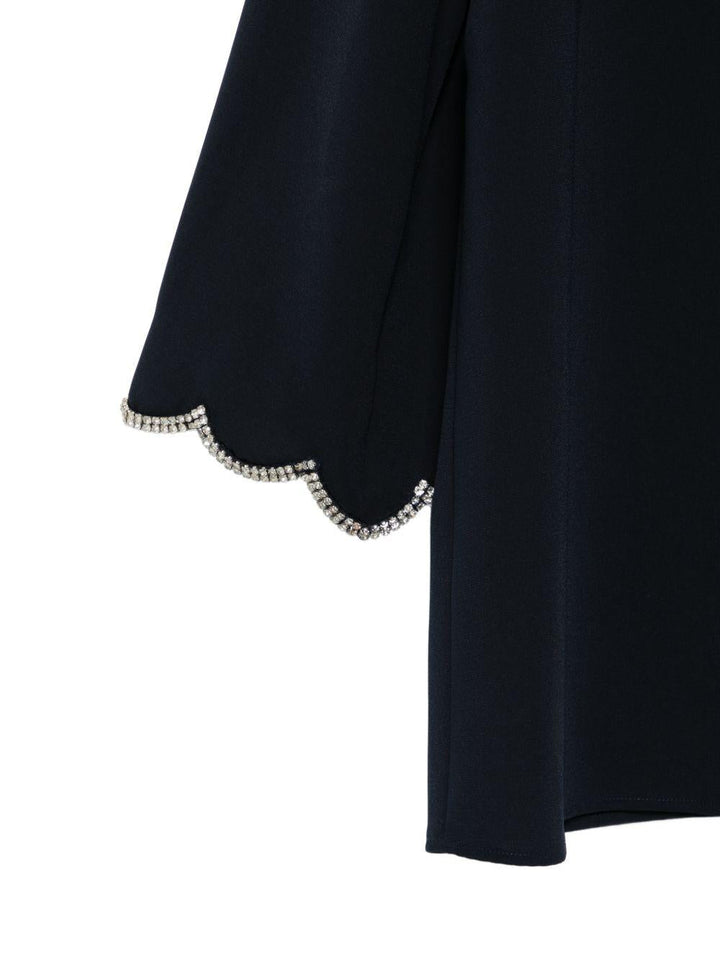 Blusa Mrecrisma con bordo a smerlo 