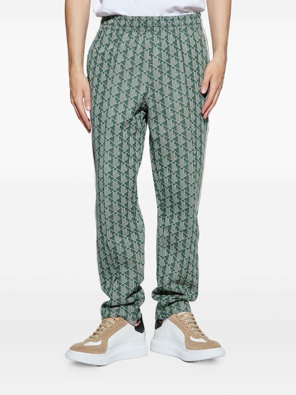 Pantaloni verdi con monogramma 