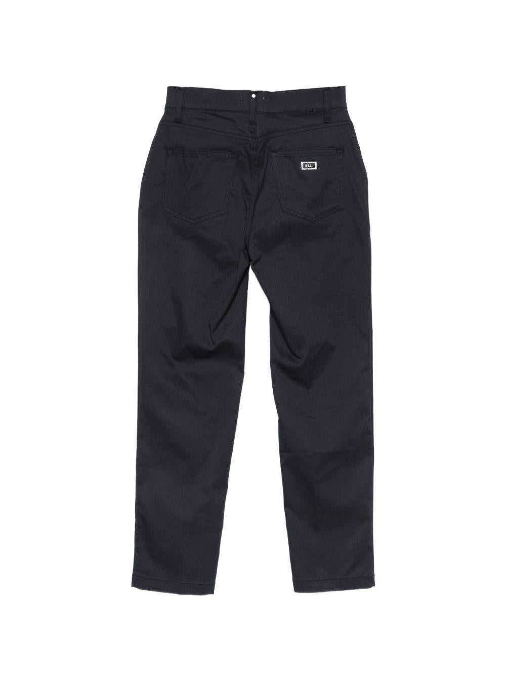 Pantaloni con patch logo 