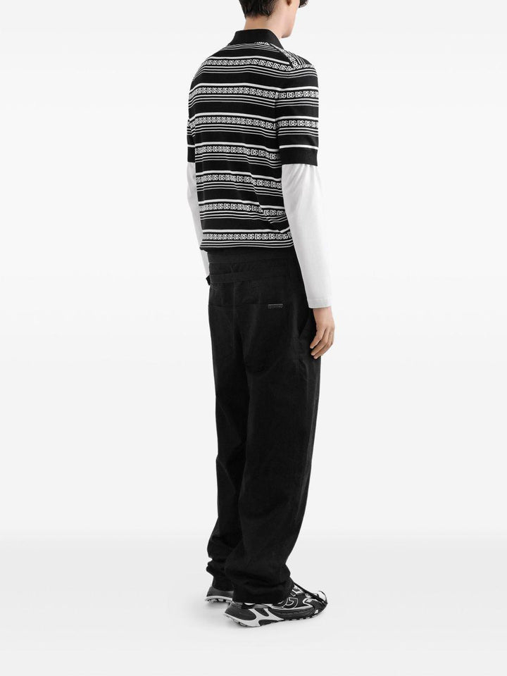Polo nera in seta con logo all-over 