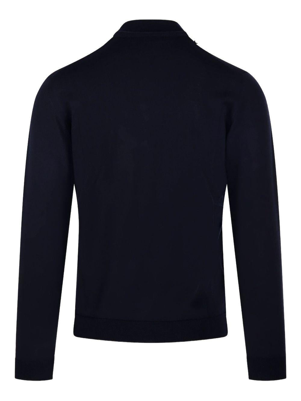 Maglione blu a collo alto in lana merino 