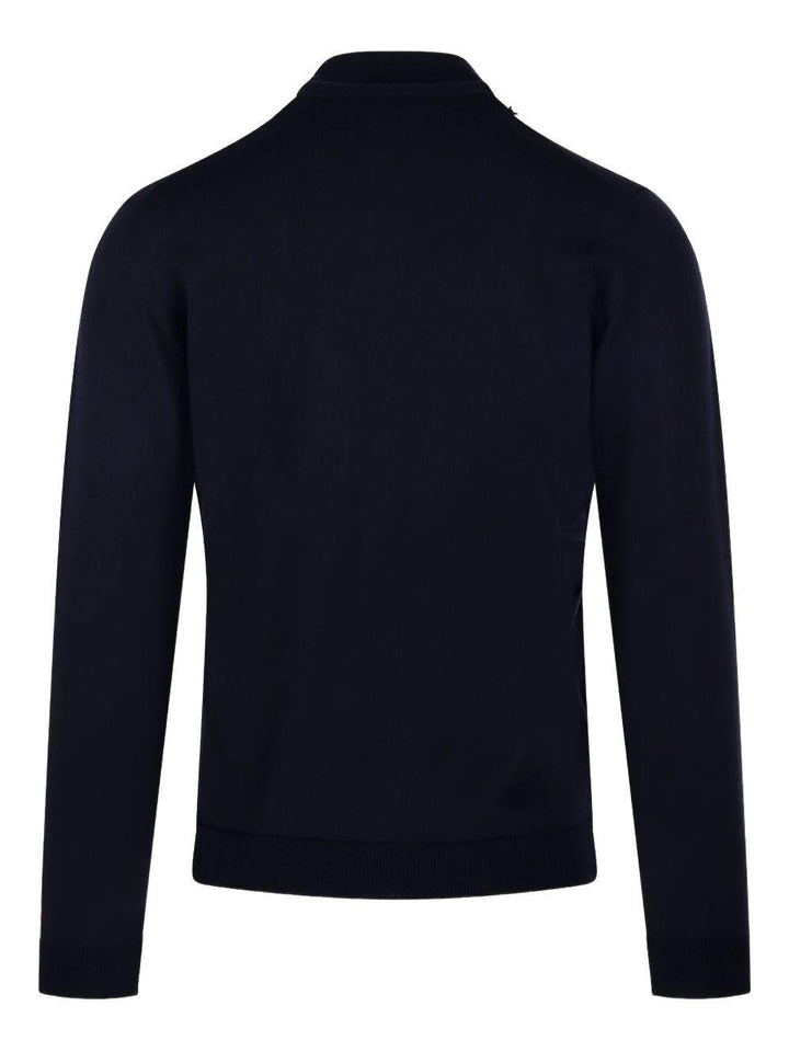 Maglione blu a collo alto in lana merino 
