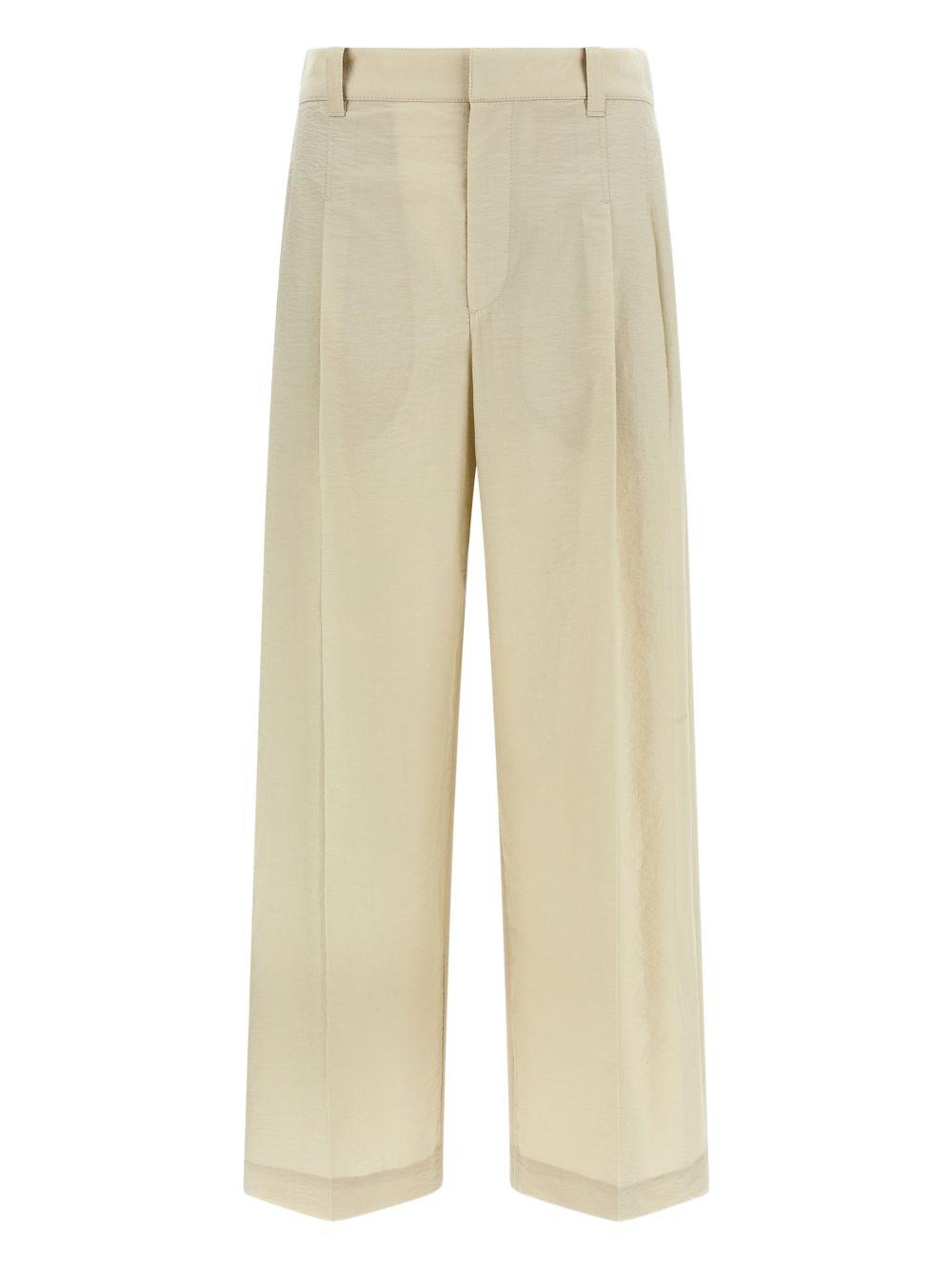 Pantaloni con pieghe frontali 