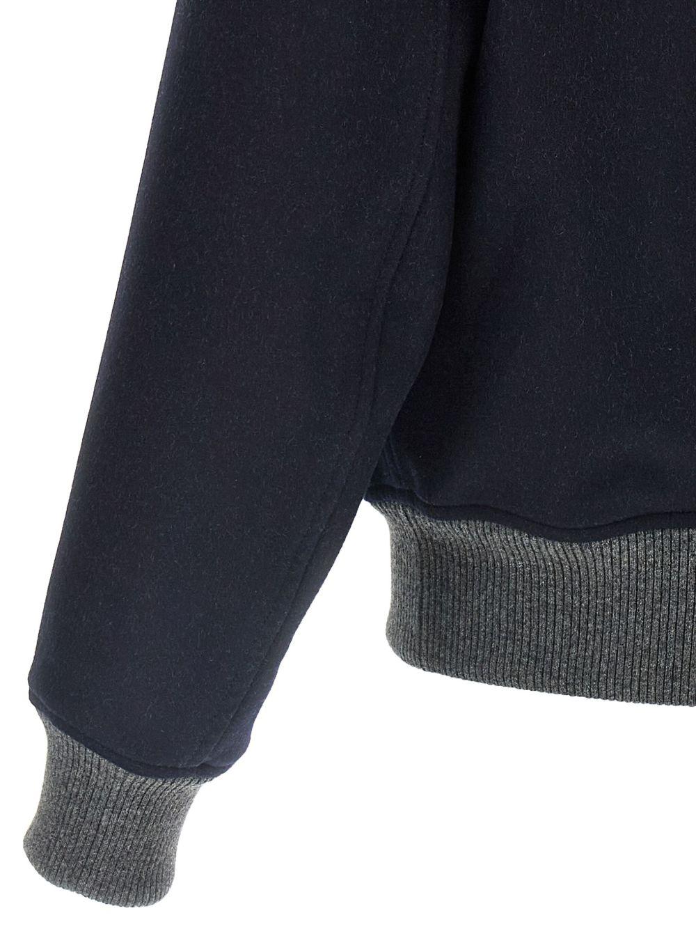 Bomber navy con bottoni e tasche con patta 