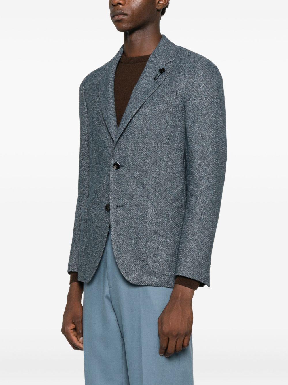 Giacca monopetto blu con revers classici 