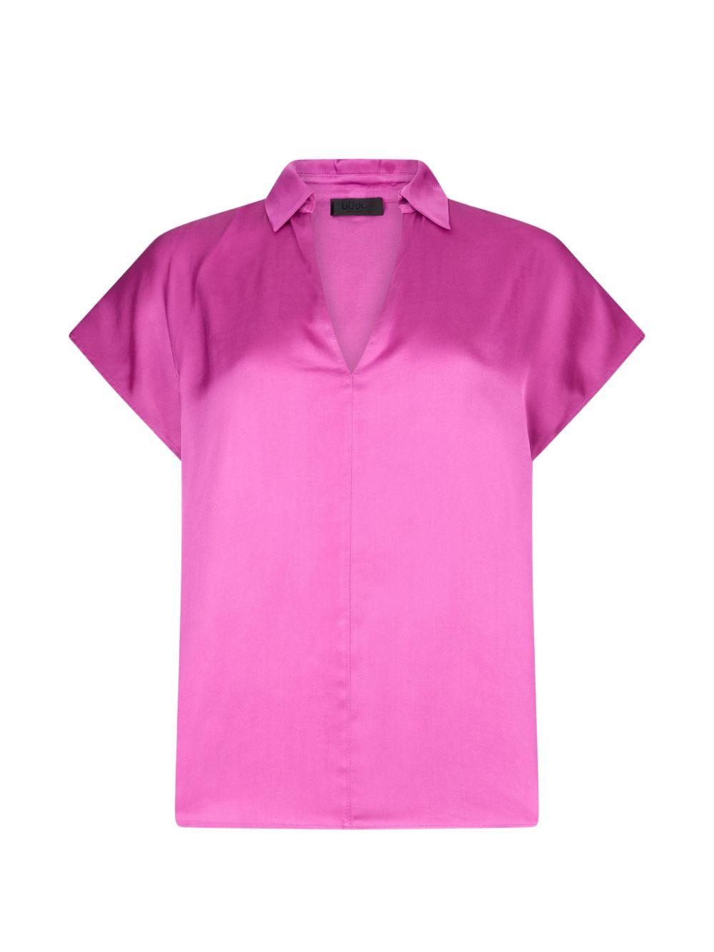 Blusa con scollo a V 