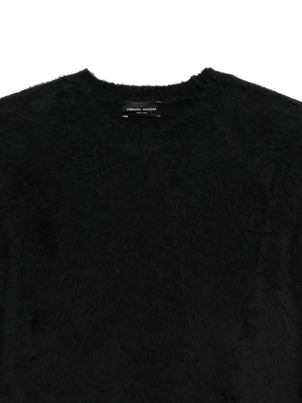 Maglione nero effetto plush con girocollo 