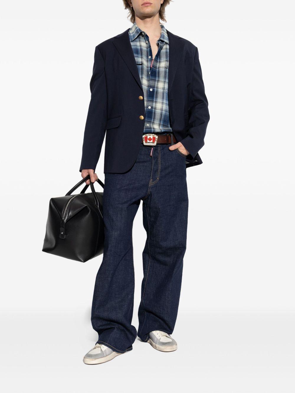 Jeans blu navy a gamba ampia con cuciture a contrasto 