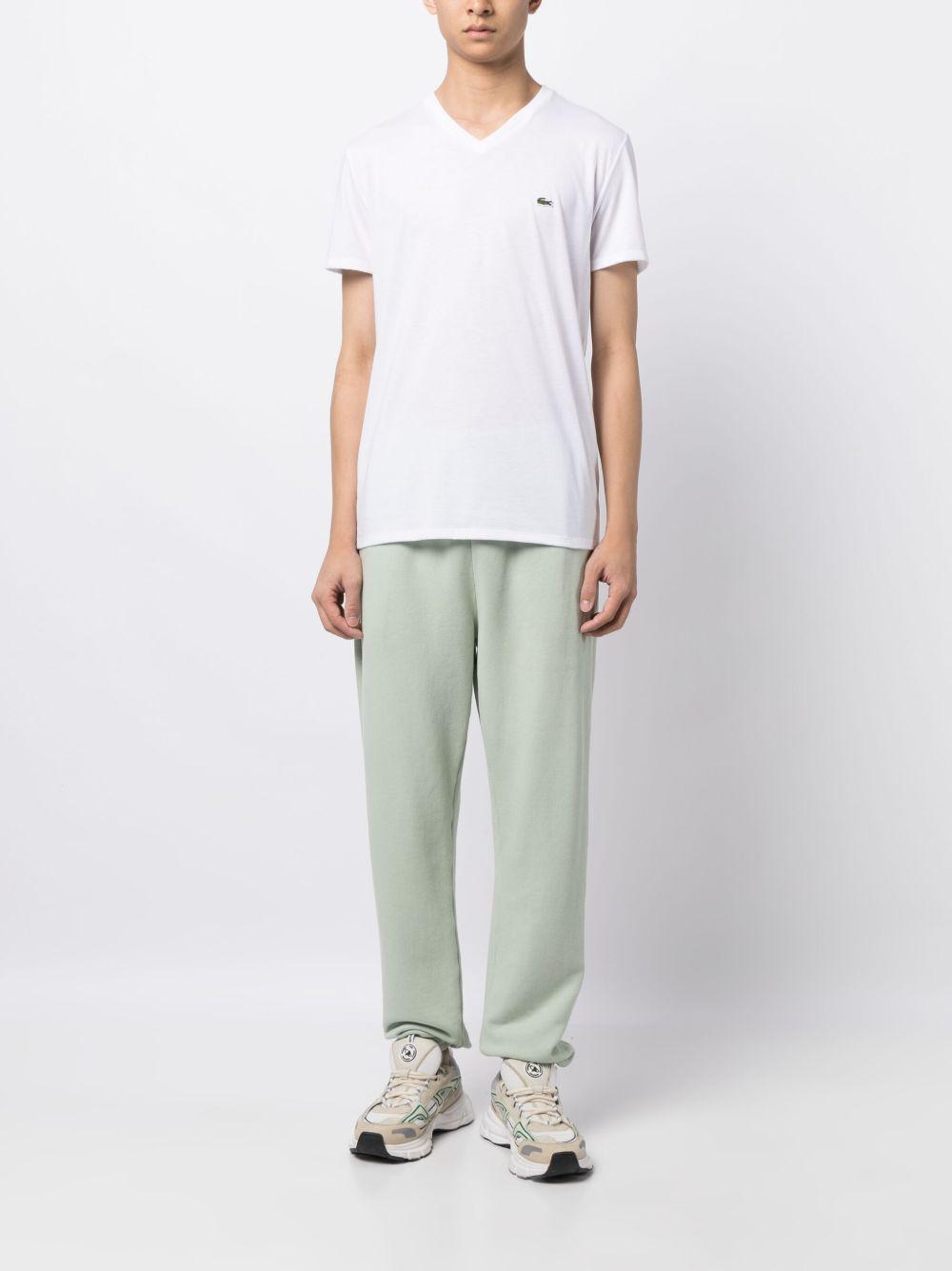 T-shirt bianca con scollo a V 