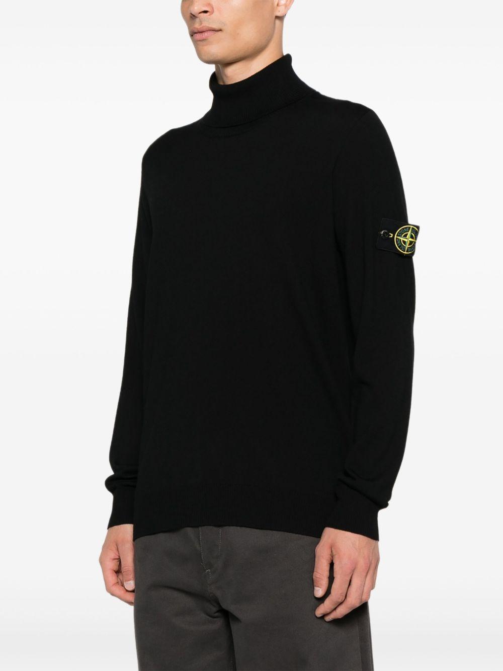 Maglione nero con applicazione Compass 