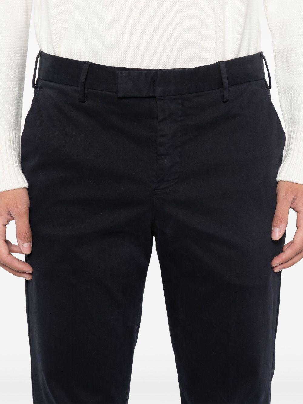 Pantaloni navy con pieghe 