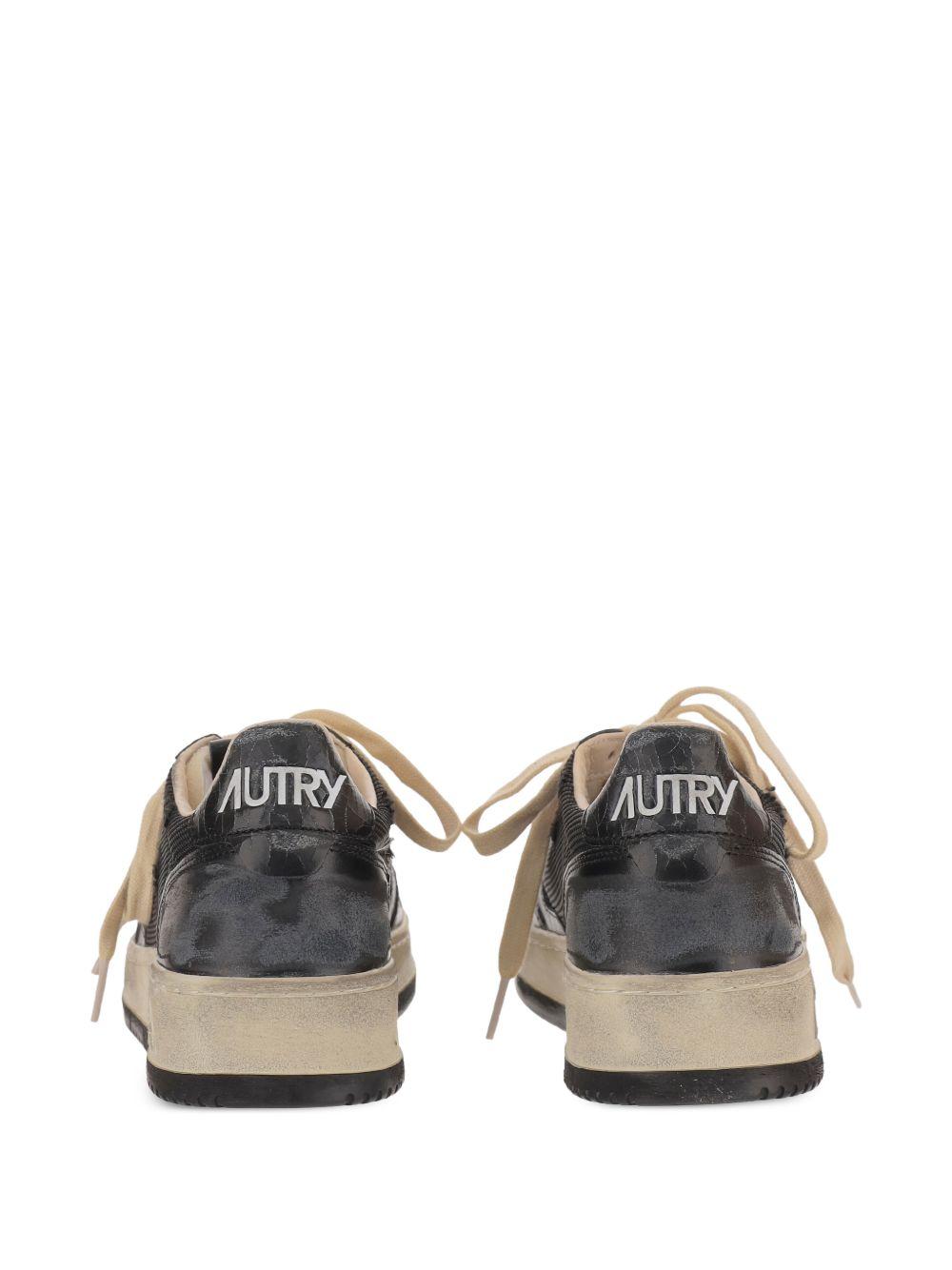 Sneakers nere con inserti 